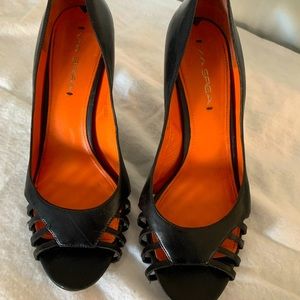 Black pumps with open toe detail